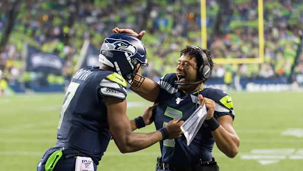 Russell Wilson, Geno Smith